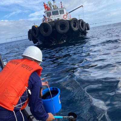 An oil spill, dark and ominous, spread across the water, threatening marine life and the livelihoods of countless coastal communities.